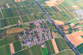 Village overview on the A65 from the southeast in Knöringen in the state Rhineland-Palatinate, Germany