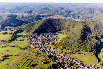 Village - view on the edge of agricultural fields and farmland in Schindhard in the state Rhineland-Palatinate, Germany