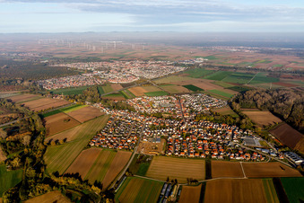 Village - view on the edge of agricultural fields and farmland in front of Ruelzheim in Kuhardt in the state Rhineland-Palatinate, Germany