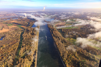 Course of the Rhine and Rhine dam cycle path under clouds from the south in Hördt in the state Rhineland-Palatinate, Germany