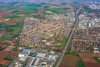 View of the town from the southeast, cut through by the A5 with ADM WILD Europe GmbH & Co. KG in Eppelheim in the state Baden-Wuerttemberg, Germany