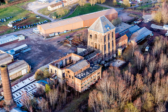 Aerial view of Demolition work on the conveyors and mining pits at the former headframe of iron foundry in Epinac in Bourgogne-Franche-Comte, France