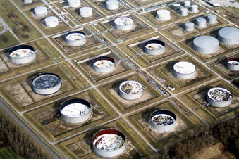 Oil tanks of the refinery on the Rhine in the district Knielingen in Karlsruhe in the state Baden-Wuerttemberg, Germany