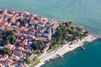 Pleasure boat marina with docks and moorings on the shore area of the Adriatic sea and old town of Novigrad in Istrien - Istarska zupanija, Croatia