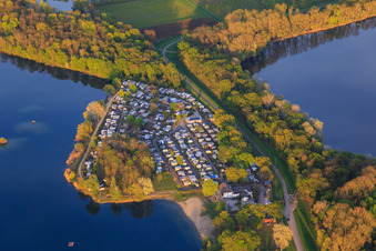 Swimming lake Lingenfeld and campsite Lingenfeld - Lingenfelder Altrheinlandschaft local recreation area in spring in Lingenfeld in the state Rhineland-Palatinate, Germany