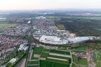 Extension - new building - construction site on the factory premises of SEW-EURODRIVE GmbH & Co KG in Graben-Neudorf in the state Baden-Wurttemberg, Germany from a drone