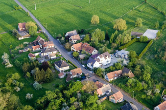 Village - view on the edge of agricultural fields and farmland in Durrenbach in Grand Est, France