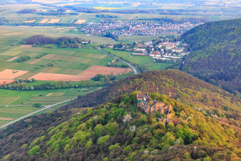 Madenburg castle ruins on an autumnally colored mountain in the Palatinate Forest from the north in Eschbach in the state Rhineland-Palatinate, Germany