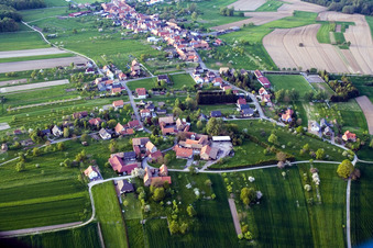 Village - view on the edge of agricultural fields and farmland in Laubach in Grand Est, France