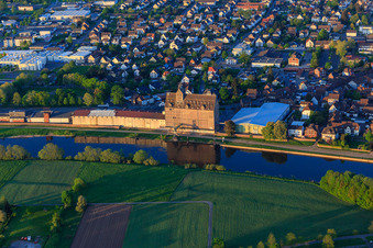 City view from the west with the warehouse on the Weser bank of RL Rieke GmbH & Co. KG in Holzminden in the state Lower Saxony, Germany
