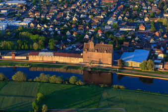 Aerial view of City view from the west with the warehouse on the Weser bank of RL Rieke GmbH & Co. KG in Holzminden in the state Lower Saxony, Germany