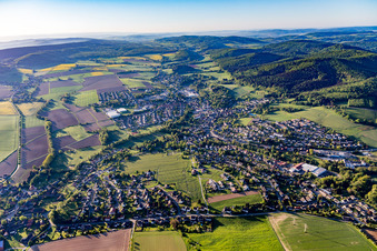 Village view on the edge of agricultural fields and land in Eschershausen in the state Lower Saxony, Germany