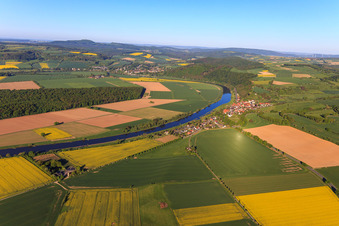 View of the town on the Weser riverbank from the east in Brevörde in the state Lower Saxony, Germany