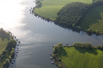 Aerial view of Puttelange-aux-Laxs, étange biscornu in Grundviller in the state Moselle, France