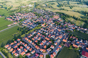Agricultural land and field borders surround the settlement area of the village in Erpolzheim in the state Rhineland-Palatinate, Germany