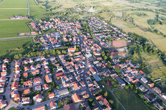 Aerial view of Agricultural land and field borders surround the settlement area of the village in Erpolzheim in the state Rhineland-Palatinate, Germany
