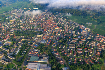 City view in the morning mist from the east in Bad Bergzabern in the state Rhineland-Palatinate, Germany