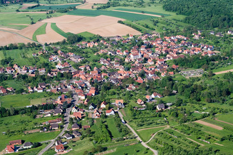 Aerial photograpy of Village - view on the edge of agricultural fields and farmland in Lampertsloch in Grand Est, France