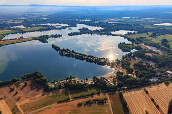 Oblique view of Leisure - Camping Erlichsee on a promontory of the quarry lake in the district Oberhausen in Oberhausen-Rheinhausen in the state Baden-Wuerttemberg, Germany