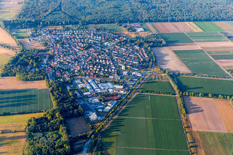 Village view on the edge of agricultural fields and land in Huettenfeld in the state Hesse, Germany