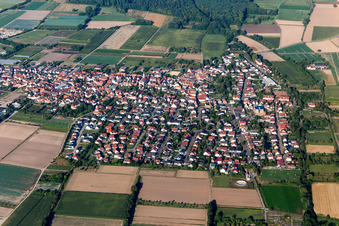 Village view on the edge of agricultural fields and land in Zeiskam in the state Rhineland-Palatinate, Germany