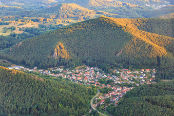 Village view from the south with Bundsandsteinfelsen rock Friedrichsfelsen in Lug in the state Rhineland-Palatinate, Germany