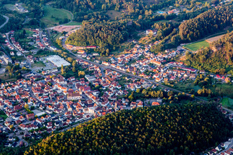 Location view of the streets and houses of residential areas in the valley landscape surrounded by mountains in Dahn in the state Rhineland-Palatinate, Germany