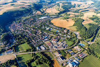 Aerial view of Location view of the streets and houses of residential areas in the Glan valley landscape surrounded by hills in Meisenheim in the state Rhineland-Palatinate, Germany