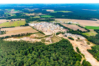 Industrial estate with wind turbine and Arkema GmbH, Siemers Transporttechnik GmbH in the district Volkstorf in Vastorf in the state Lower Saxony, Germany