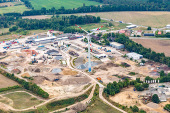 Wind turbine in the industrial park with Arkema GmbH in Barendorf in the state Lower Saxony, Germany