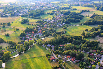Village view along the Ilmenau from the south in the district Wichmannsburg in Bienenbüttel in the state Lower Saxony, Germany
