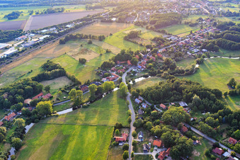 Village view along the Ilmenau from the southwest in the district Wichmannsburg in Bienenbüttel in the state Lower Saxony, Germany