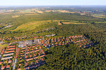 View of the village from the west in the forest in the district Bockelsberg in Lüneburg in the state Lower Saxony, Germany
