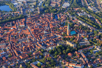 Overview of the old town area and city center from the southwest in the evening with Große Bäckerstraße from St. Johannis Lüneburg to St. Nicolai in Lüneburg in the state Lower Saxony, Germany
