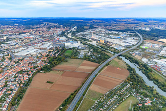 Motorway bridge of the A70 over the Main to the Maintal industrial estate in the district Oberndorf in Schweinfurt in the state Bavaria, Germany