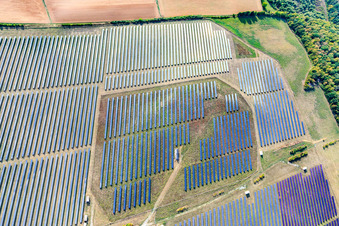 Aerial view of Large open-space solar power systems in the district Moos in Geroldshausen in the state Bavaria, Germany