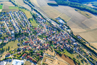 Village view along the railway line from the northeast in the district Eubigheim in Ahorn in the state Baden-Wuerttemberg, Germany