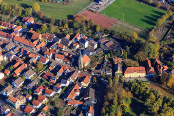 Church and sports field in the district Eichtersheim in Angelbachtal in the state Baden-Wuerttemberg, Germany