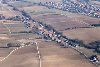 Aerial view of Village - view on the edge of agricultural fields and farmland in Vollmersweiler in the state Rhineland-Palatinate, Germany