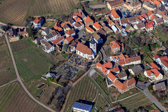 Kirchgasse with cemetery and parish church of St. Peter and Paul in Weyher in der Pfalz in the state Rhineland-Palatinate, Germany