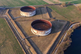Two old oil tanks from the former tank farm in Jockgrim in the state Rhineland-Palatinate, Germany