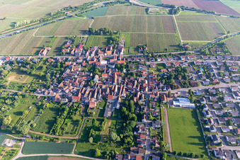 Bird's eye view of Agricultural land and field borders surround the settlement area of the village in Dammheim in the state Rhineland-Palatinate, Germany