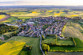 Agricultural land and field borders surround the settlement area of the village in Hochmoessingen in the state Baden-Wurttemberg, Germany