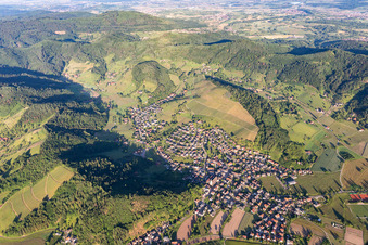 Location view of the streets and houses of residential areas in the valley landscape surrounded by mountains in Berghaupten in the state Baden-Wurttemberg, Germany