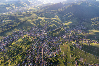 Location view of the streets and houses of residential areas in the valley landscape surrounded by Wine-Yards in Zell-Weierbach in the state Baden-Wurttemberg, Germany
