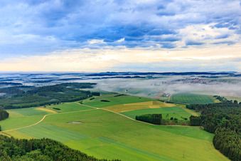 Aerial view of From the southeast under fog in Neuhausen ob Eck in the state Baden-Wuerttemberg, Germany