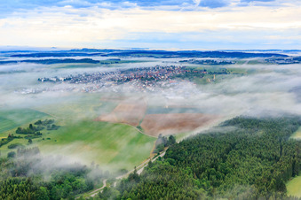 From the east under fog in Neuhausen ob Eck in the state Baden-Wuerttemberg, Germany