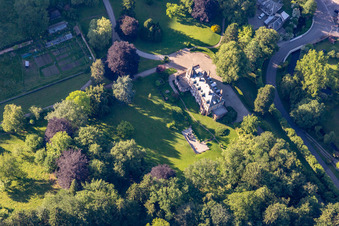 Complex of the hotel building Domaine Jaegerthal in a green valley in the district Jaegerthal in Windstein in Grand Est, France