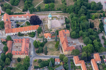 District office of the Ilm district, tower of the Neideck castle ruins and castle square fountain in Arnstadt in the state Thuringia, Germany