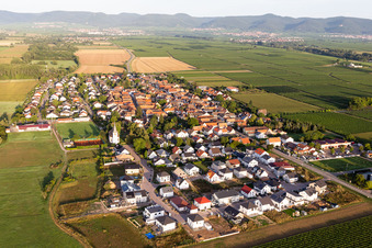 Agricultural land and field borders surround the settlement area of the village in Altdorf in the state Rhineland-Palatinate, Germany